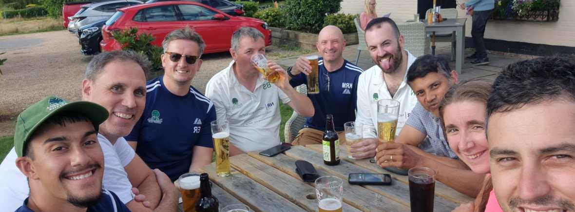 Park Hill Cricket Club players enjoying a drink together after a match