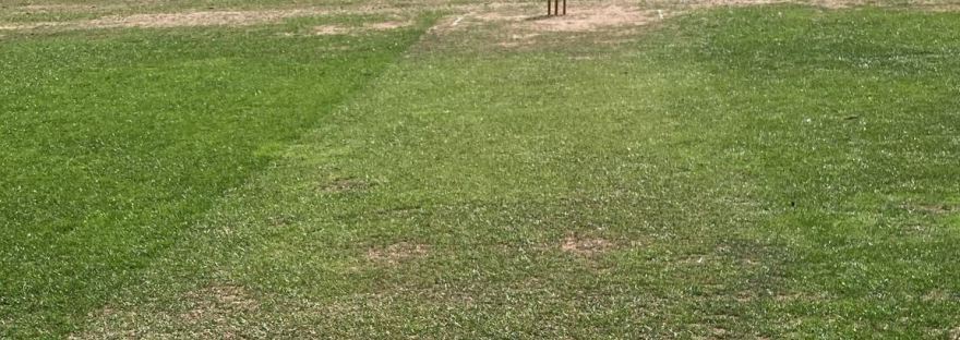 Cricket pitch at Chrystie Road Recreation Ground with stumps at the far end and a bare, patchy strip in the foreground, before Park Hill vs Tadworth on 5 September 2026